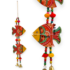 Decorative hanging with colorful fish designs and beads on a white background